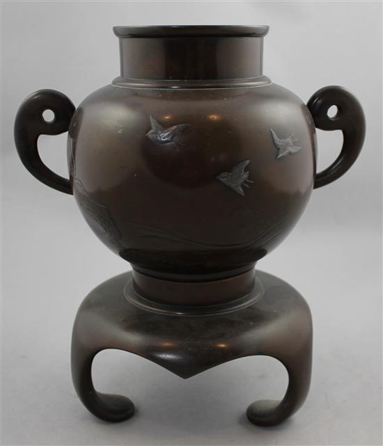 A Japanese inlaid bronze two handled vase and stand, Meiji period, 26cm